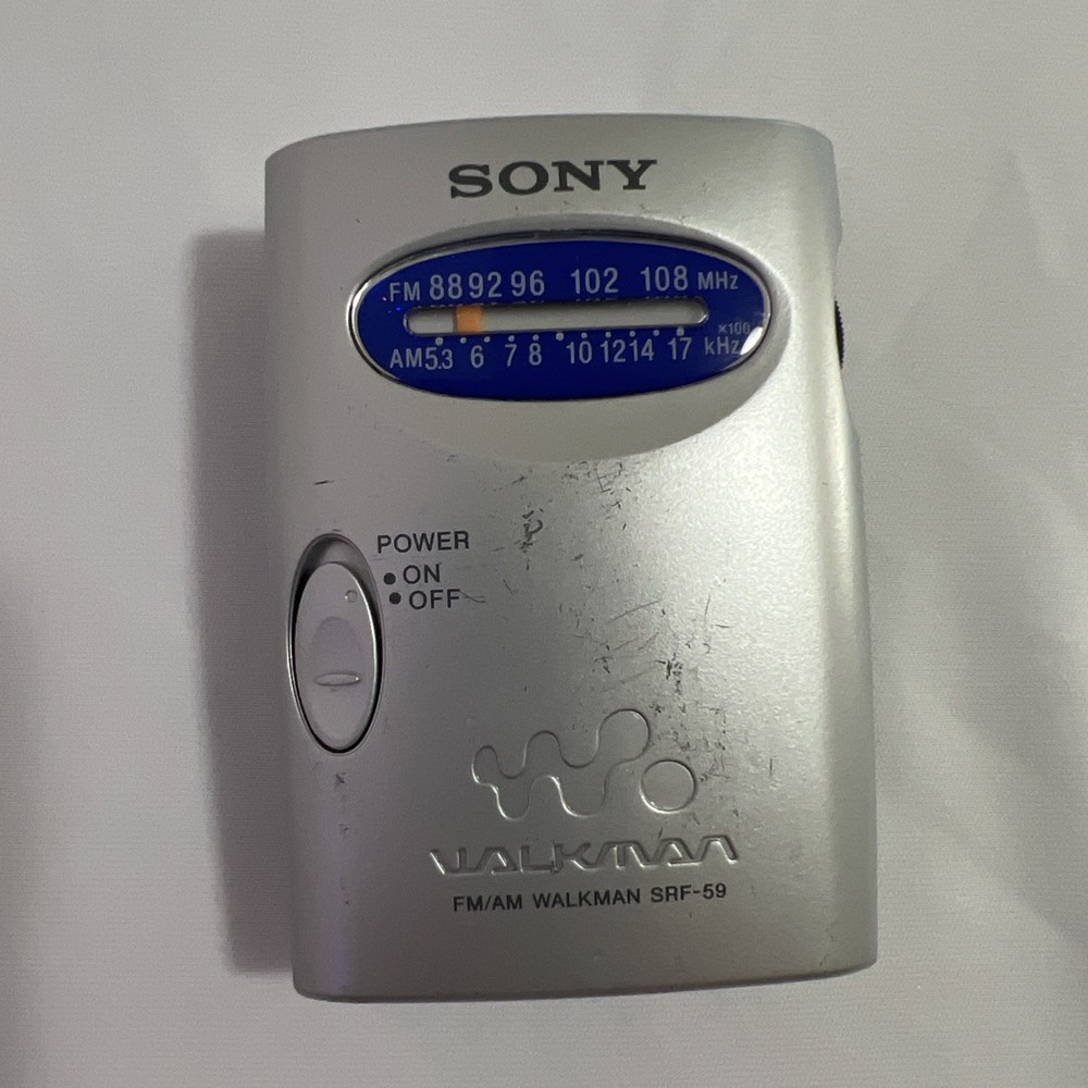 Sony SRF-59 AM/FM Walkman Radio Silver with Belt Clip Tested Working