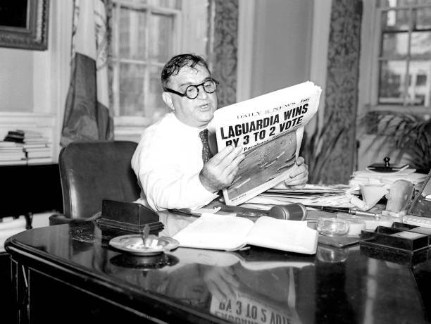 Mayor Fiorello LaGuardia reading the Daily News election results i .. Old Photo