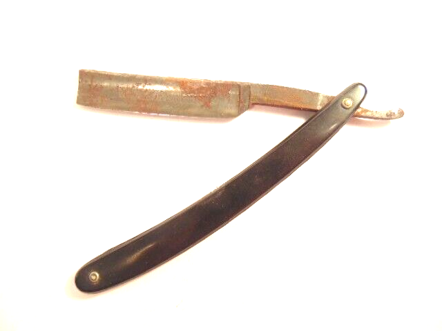 old black straight razor labeled J. Wies & Sons, Newark, N.J.; some corrosion