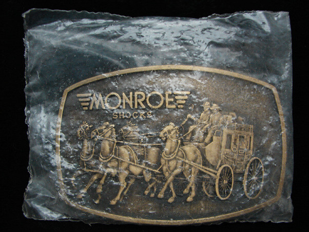 OI09129 *NOS* VINTAGE 1970s **MONROE SHOCKS** AUTO PARTS BRASSTONE BELT BUCKLE