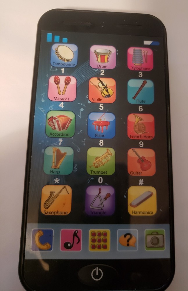 Preowned Educational toy phone that plays musical instruments, numbers, and came