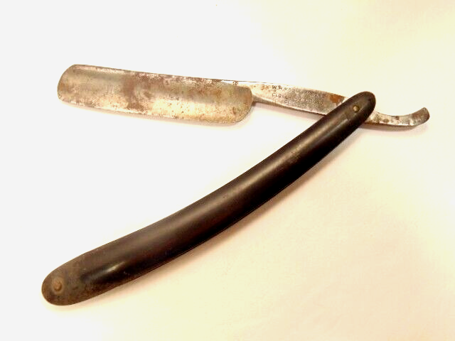 old straight razor labeled W.H. Morley & Sons / Clover Brand, Germany
