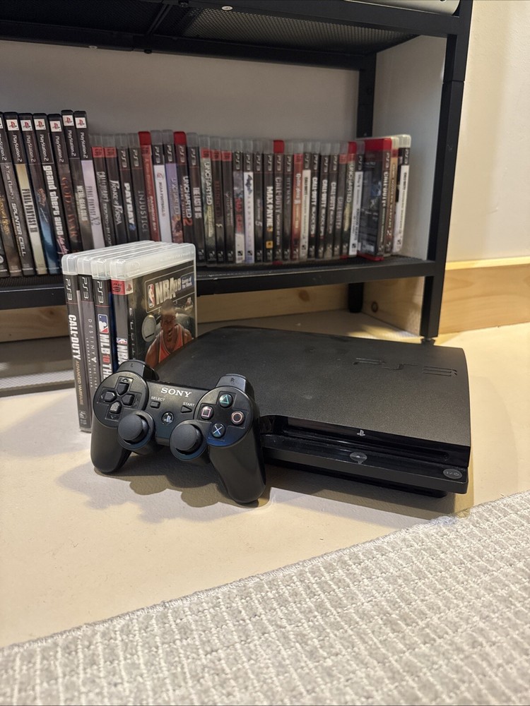 Sony PlayStation 3 Slim Launch Edition 320GB Console - Charcoal Black + 4 Games