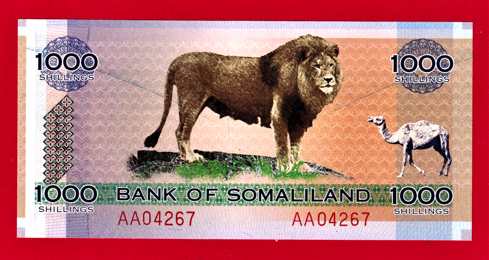 RARE 1,000 SHILLINGS 2006 SOMALILAND UNC NOTE Prefix 'AA' LOW SERIAL LION CAMEL-image