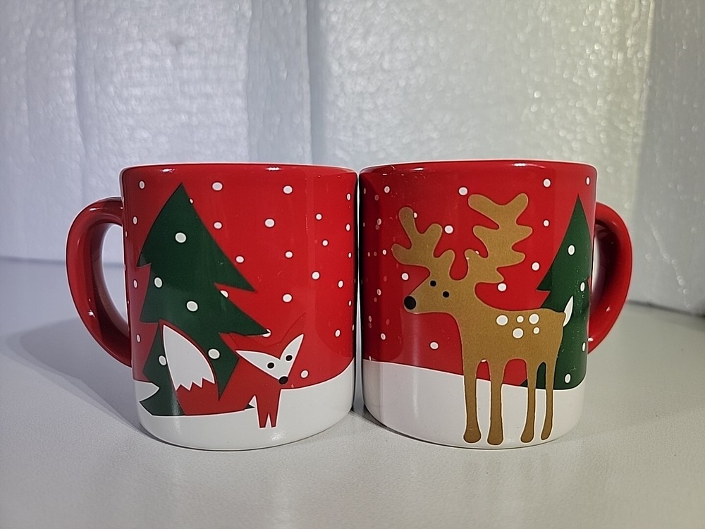 Crate & Barrel 2015 Joan Anderson Christmas Kids Mugs Set of 2 Fox Reindeer Tree