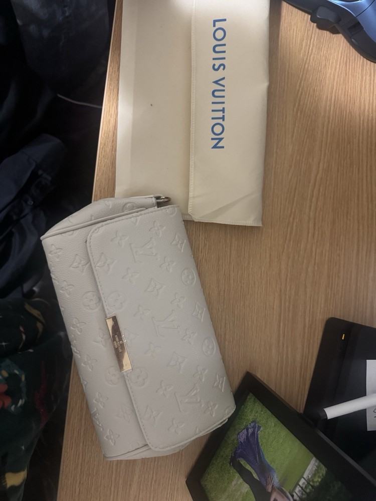 Louis Vuitton cream tote bag one size versatile for any occasion