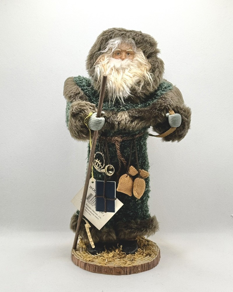 Woodland Santa Figure with Green Coat, Toy Basket, and Rustic Beard for Earthy Holiday Decor