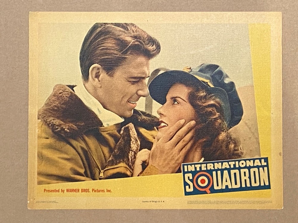 INTERNATIONAL SQUADRON '41 RONALD REAGAN ABOUT TO KISS OLYMPE BRANDA LC