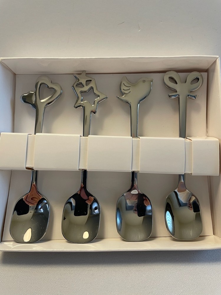 Good Luck set of four decorative stainless steel tea spoons
