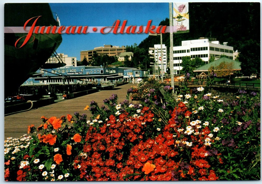 A cruise ship docks at the colorful Juneau waterfront - Juneau, Alaska
