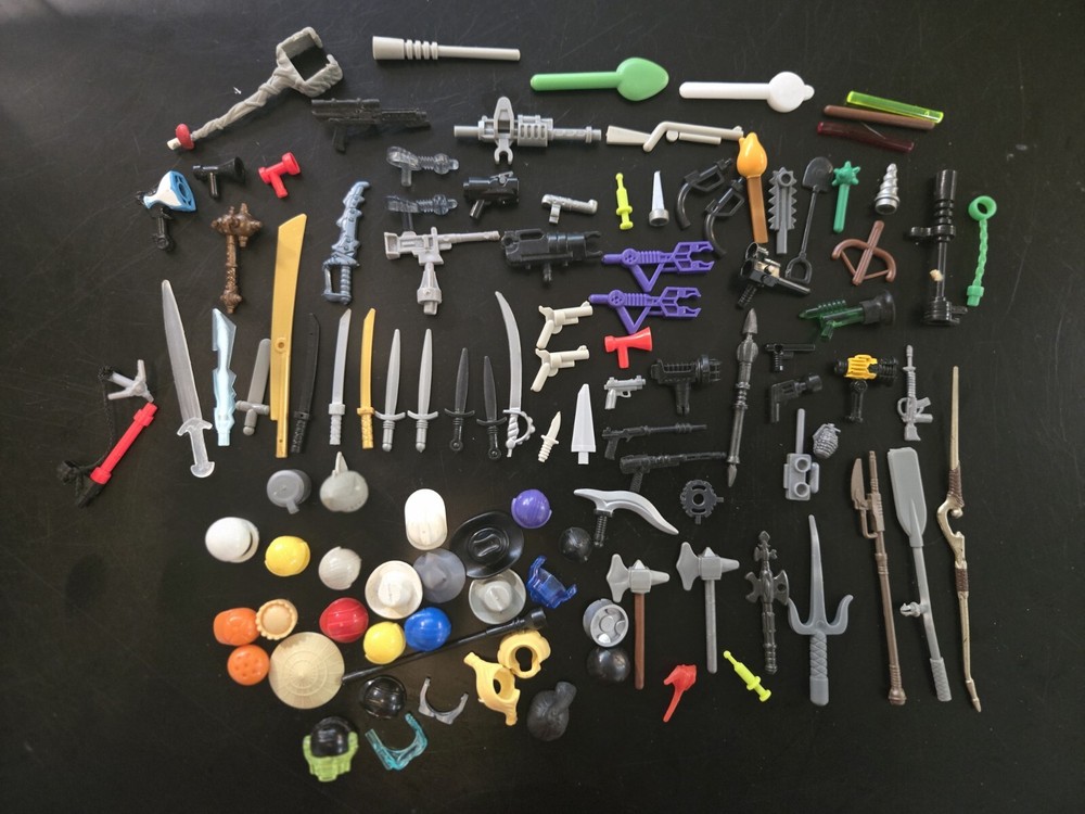 Lot Of Lego, Mega Bloks And Other Action Figure Weapons And Helmets 80+ Pieces