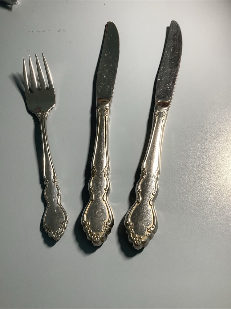 3 Pieces of Oneida Dover salad fork and dinner knives