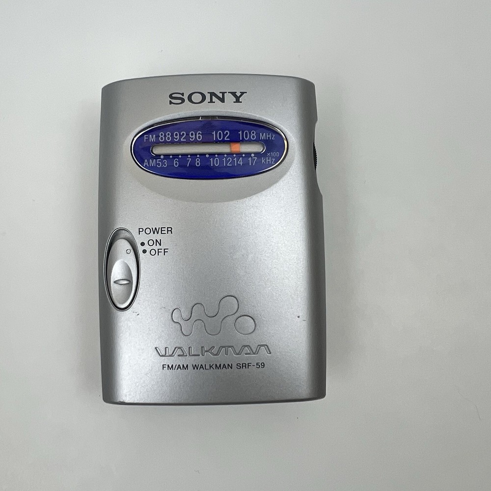 Sony Walkman SRF-59 AM FM Portable Radio w/ Belt Clip Tested, Working Good.