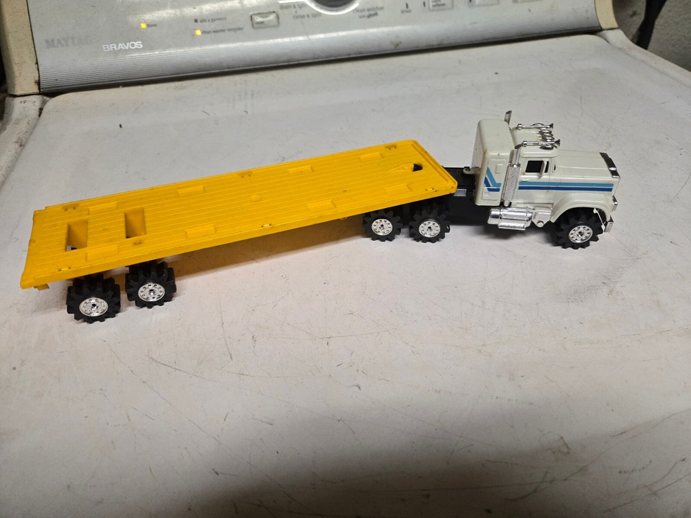 Vintage Semi truck and Flatbed Trailer Schaper Stomper Road King