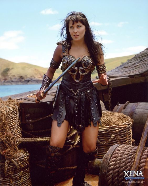 Lucy Lawless In Xena Warrior Princes Holding A Sword On Boat 8x10 Picture Celebr