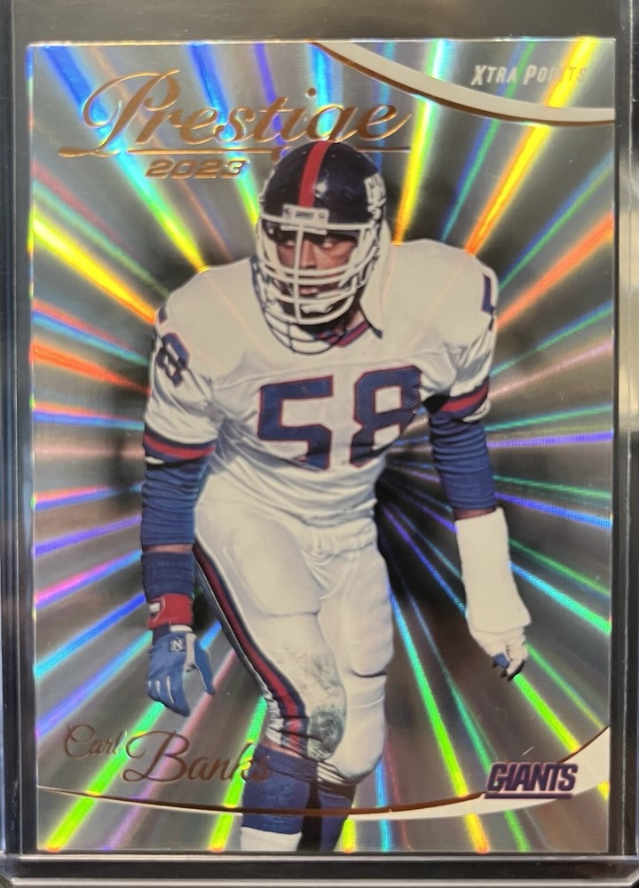 2023 Panini Prestige Xtra Points Sunburst #216 Carl Banks Football Card